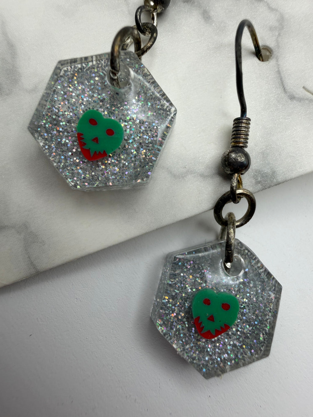 The Tiniest Poison Apple! Silver Glitter Hexagon Earrings