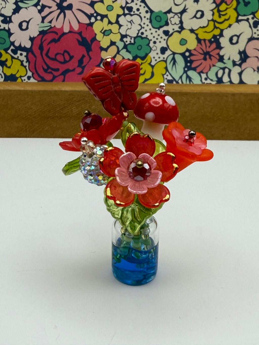 Tiny Red Flower Bouquet In Jar