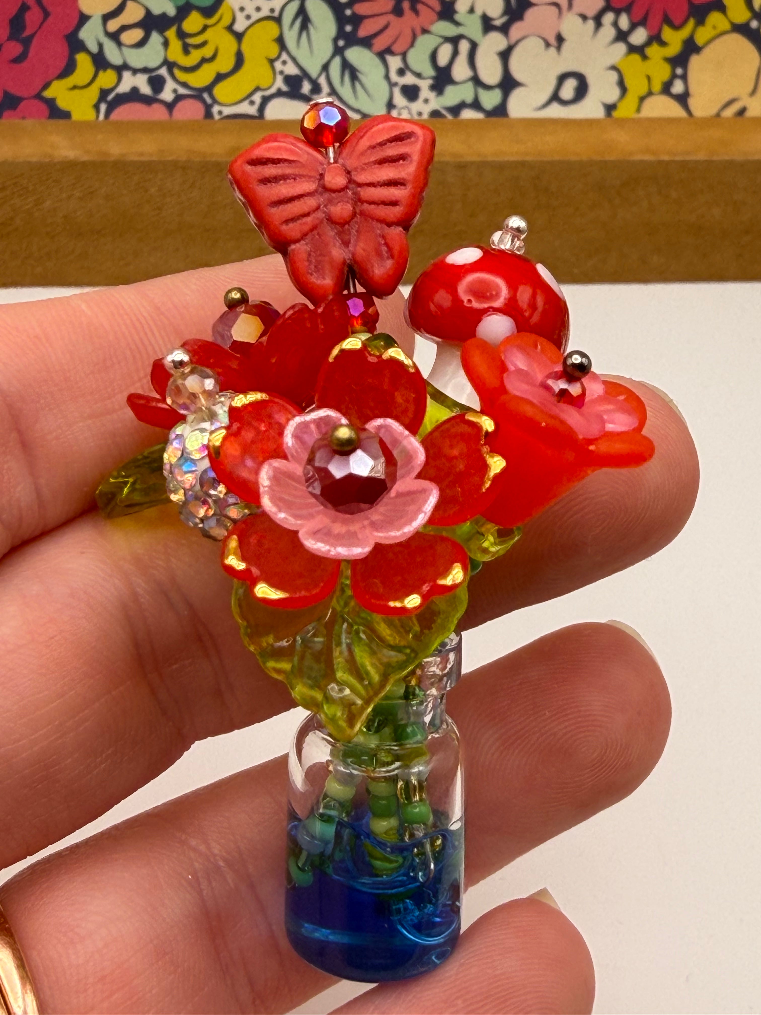 Tiny Red Flower Bouquet In Jar